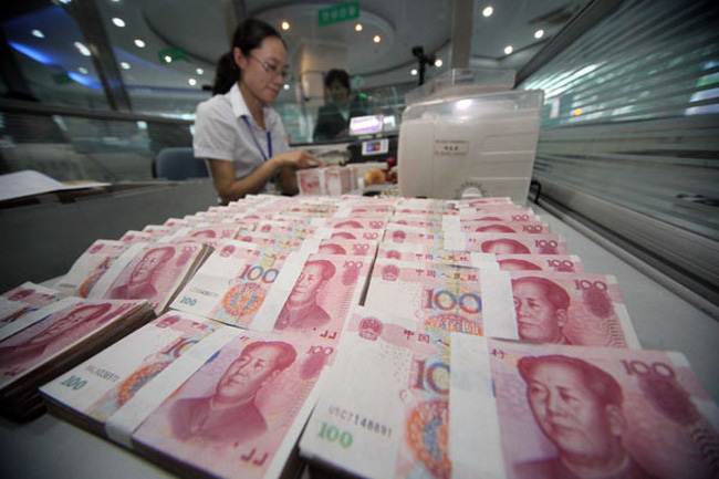 Đầu tư của Trung Quốc ra nước ngoài giảm gần một nửa 